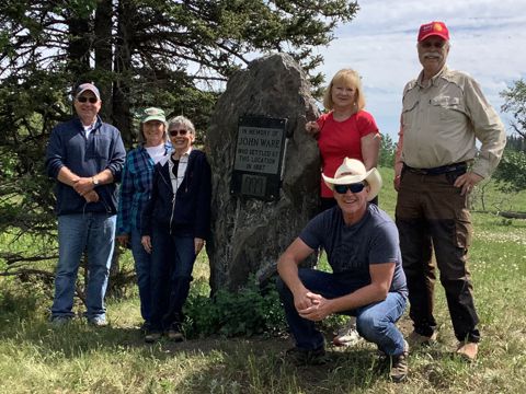 Members of the County Historical Committee visiting the John Ware home site west of Millarville