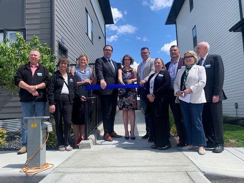 Westwind's Board and Minister Nixon at the grand opening of 10 affordable housing units in Drakes Landing